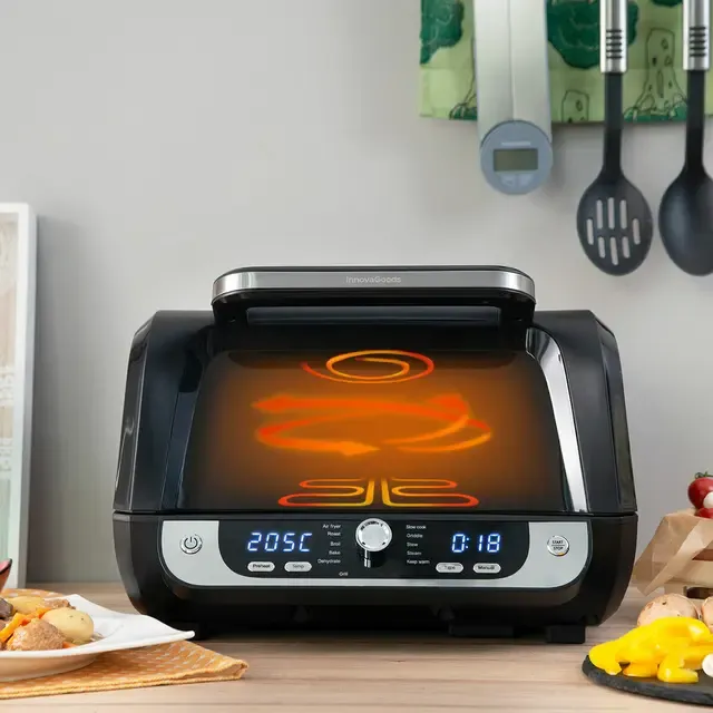 friteuse-a-air-avec-gril-accessoires-et-livre-de-recettes-innovagoods-fryinn-12-in-1-6000-noir-acier-3400-w-6-l_749325 (1).webp
